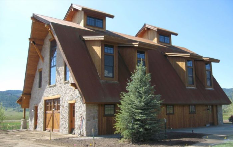 Beautiful residential roofing installation on a rustic mountain timber frame home.